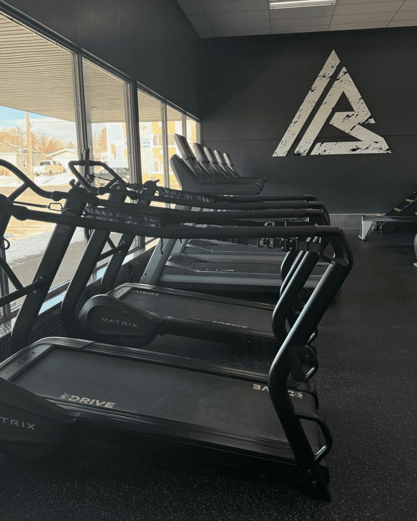 Cardio area with Iron Bar branding
